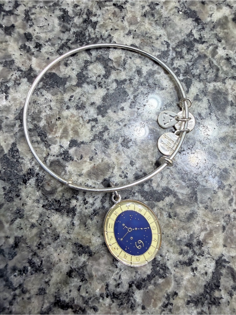 Alex and Ani Silver Bangle with Blue and Gold Zodiac Charm